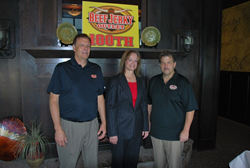 Beef Jerky Outlet COO Paul Lyons and President Scott Parker sell 100th franchise.