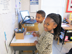 Photo of at risk students using Letter alive