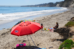Family recently enjoying Haskell’s Beach in Goleta, down the coast from Refugio State Beach, which is set to reopen July 17. All other major Santa Barbara County beaches are open.