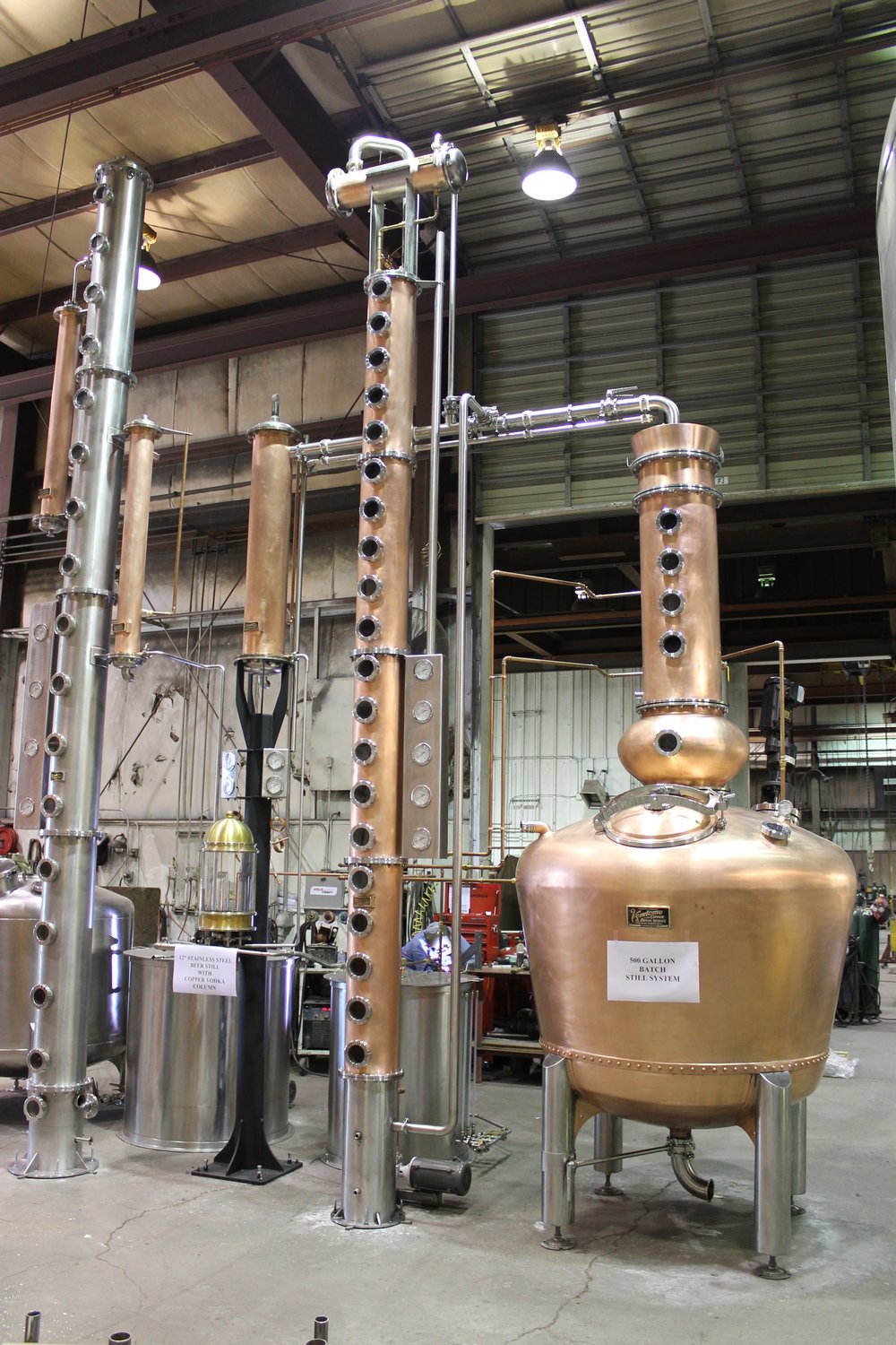 Salt Lake City’s Dented Brick Distillery Hires New Deal Distillery's