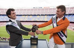 Sydney 2000 Olympic Jumping gold medallist and current World European champion Jeroen Dubbeldam (NED), right, and Sergio Álvarez Moya (ESP) wrestle with the Furusiyya trophy at Barcelona FC