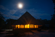 Amazon ayahuasca ceremonial maloka in the moonlight.