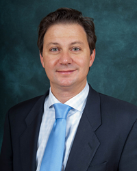 David Palumbo in a suit.