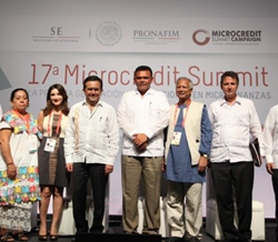 A microfinance client, General Coordinator for PRONAFIM, Mexico's Secretary of Economy, Governor of the State of Yucatán, Muhammad Yunus, and Larry Reed (director of the Microcredit Summit Campaign)