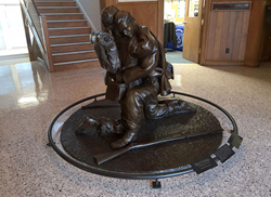 The life-size bronze statue, "Brothers" by sculptor Gary Casteel, honors the emotional and physical sacrifices made by our veterans of war