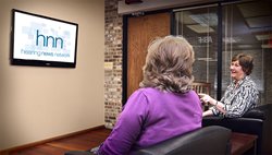 Example of CDM's Hearing News Network (HNN) in a waiting room.