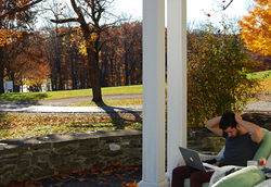 Writer Scott Rodd works on his book about the five poorest towns in America at the Carey Institute ‘s Nonfiction Residency.