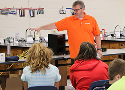 Brian Hedges, Training Manager at Balluff, spends the day teaching about sensors to students at Scott County Middle School.