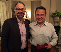 PROSHRED Security CEO Jeff Hasham presents award to Proshred Georgia's Greg Gálvez