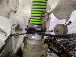 Kwik Bandit securely tiled around Cam Lock Arms on Tanker Truck