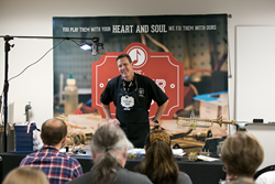 John Blythe leads a workshop for local music educators at Music & Arts' "The Repair Shop."