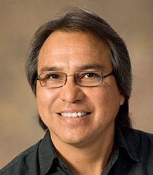 A portrait of James Anaya.