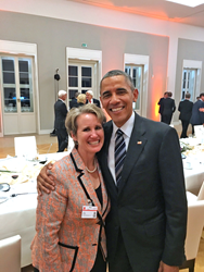Natalie Kaddas and President Barack Obama at a dinner in Germany.