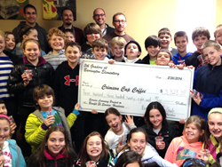 Barrington Elementary Students with a Check for Money They Raised to Help Honduran Students