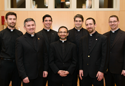 A few of the Jesuits being ordained this year gathered at the Boston College School of Theology and Ministry.