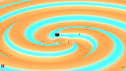 Two black holes merged and released gravity waves that reached Earth on December 26, 2015, marking the second observation of gravity waves by the twin LIGO detectors. Credit: Max Planck Institute/SXS