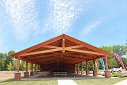 The community pavilion that New Energy Works Timberframers created for the Saratoga Regional YMCA has a scissors truss design that forms a vaulted ceiling and creates optimal space for activities.