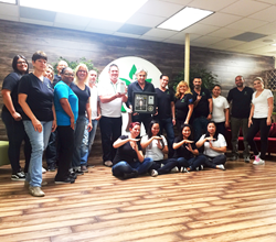 Treeium HQ team with last year Inc. 500 prize and CEO Moty Ginsburg