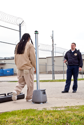 Inmate walking by CellsensePLUS unit