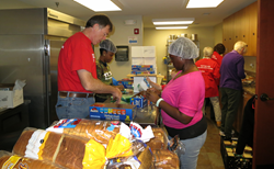 Volunteers assemble lunches for people in need during the 2015 service event at Monte Sano United Methodist Church.