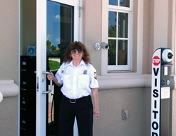 Rida Hernandez, who has a disability, guards the front gate at Hawthorne Community