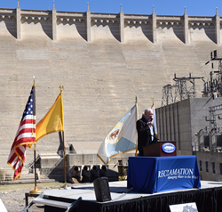 Assistant Area Manager Ken Rice speaks at the Centennial celebration today at Elephant Butte Dam.