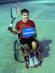 Image of Dylan Wells in tennis chair