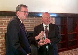 Sandy MacDonald (right) receives Renewable Natural Resources Foundation 2016 Sustained Achievement Award