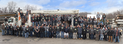 New Energy Works employees gathered for their annual group photo along with their sister company Pioneer Millworks.