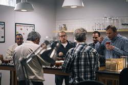 Coffee farmers from Olopa, Guatemala cup coffee in the Crimson Cup Innovation Lab