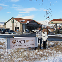 Ziggi's Coffee franchisees, Steve and Jill Anderson, stand in front of a sign at the site of their new drive-thru location on the corner of 43rd St. and Taft in Loveland, Colo.