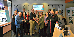 Mark and Darrie Daniels (center) joined by friends and community members at their Minuteman Press grand opening in Tyler, Texas - learn more about Minuteman Press franchise opportunities at http://www.minutemanpressfranchise.com