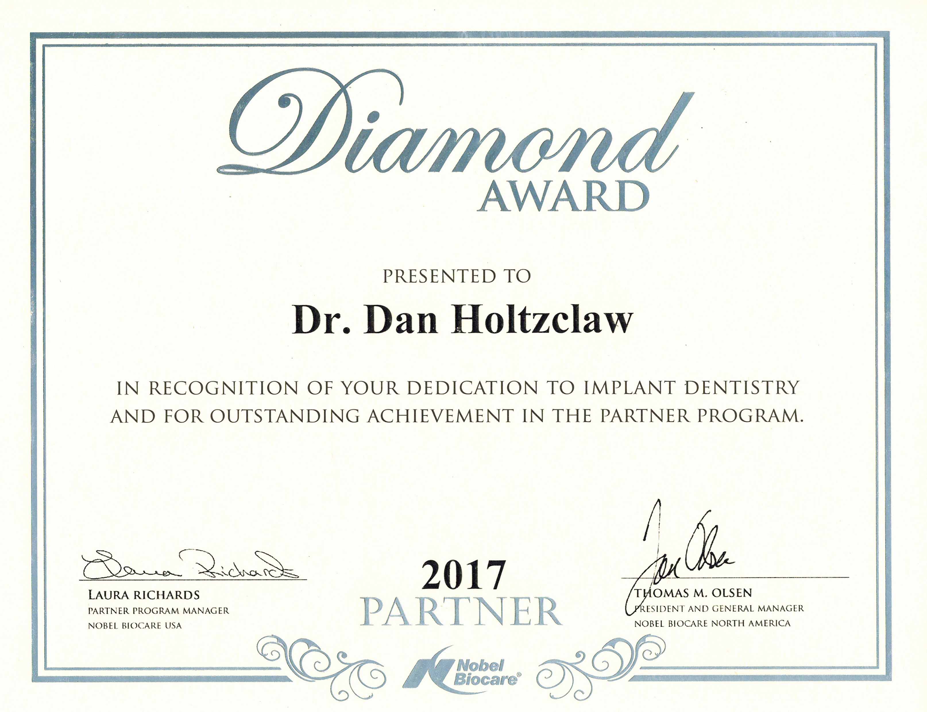 Nobel Biocare Tm Dental Implant Company Presents Diamond Award To Dr Dan Holtzclaw Of Austin Texas