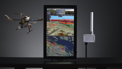 The uAvionix PingStation ADS-B receiver is shown next to a workstation running Kongsberg Geospatial’s IRIS UAS airspace situational awareness display
