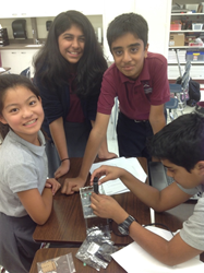 Stratford students working on an experiment
