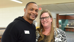Paige Lester Pruett (at right) with fellow Trustee, Eddie George, following this past May's Board of Trustees meeting