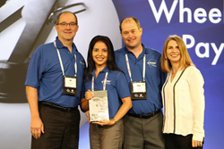 Accepting the Award, from Office Products International Director, Janet Bell, are MMF team members , left to right, Jeff Alm, National Sales Manager, Ivelisse Gomez, Sr Product Development and Marketing Manager, Philip Robins, VP MMF Industries