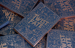 stack of "Twist Fate" books
