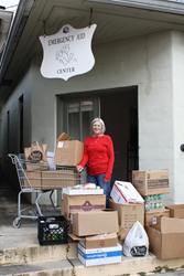 Patti Ibert poses with a recent donation made by the employees of Cypress Bayou Casino Hotel.