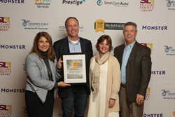 Access Development executives pose with their Top Workplaces Award, presented by the Salt Lake Tribune