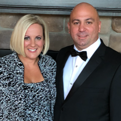 Sarah and Ryan Markham accept Weatherhead 100 for QualityIP.