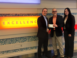 Dr. Mark Daniels, division chief of endocrinology and diabetes, CHOC; David Jewell, marketing communications manager, Yamaha Corporation of America; and Winnie Tran, manager, corporate relations, CHOC.
