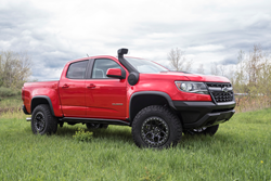 Chevrolet Colorado Accessorized with AEV Snorkel Kit and Crestone DualSport wheels.