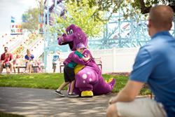 Child Hugging Duke the Dragon