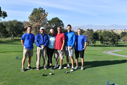 Clint Ensign (second from left), family members and two SLCC students (far left and right) pose at one of the Hidden Valley holes.