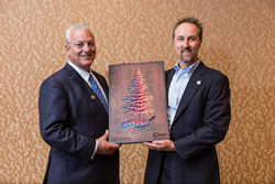 Quik! CEO Richard Walker presents a 2019 ReTree Award to Docupace CEO Mark Tapling