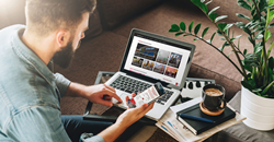 A man browsing Franchising.com in search of a new franchise opportunity.
