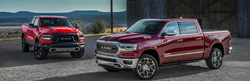 Two 2019 RAM 1500s parked outside