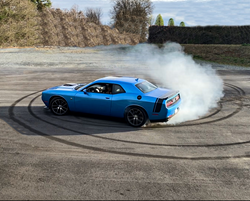 Gray Leadbetter did "donuts" and delivered donuts to police in her Dodge Challenger.