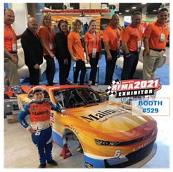 The MaintenX conference team with Ryan Vargas and his car.